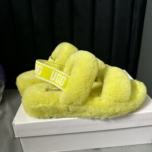 - worn once 

- size 7 

- neon green Ugg slippers